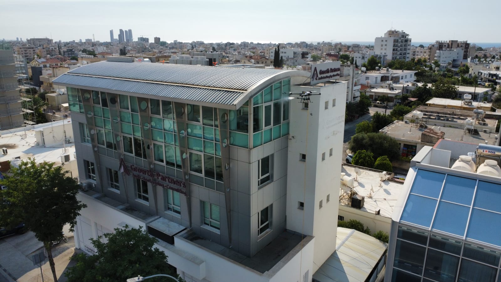 Aerial view of the Growth Partners building and surrounding Limassol skyline